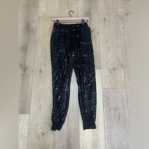 XOXO black sequin joggers